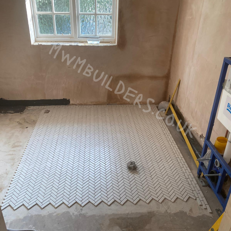 Tiled shower base, wet rooms and bathrooms in Maidenhead Windsor Marlow Builders.